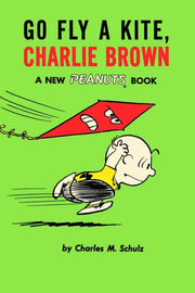 Peanuts paperback books Go Fly A Kite Charlie Brown #1